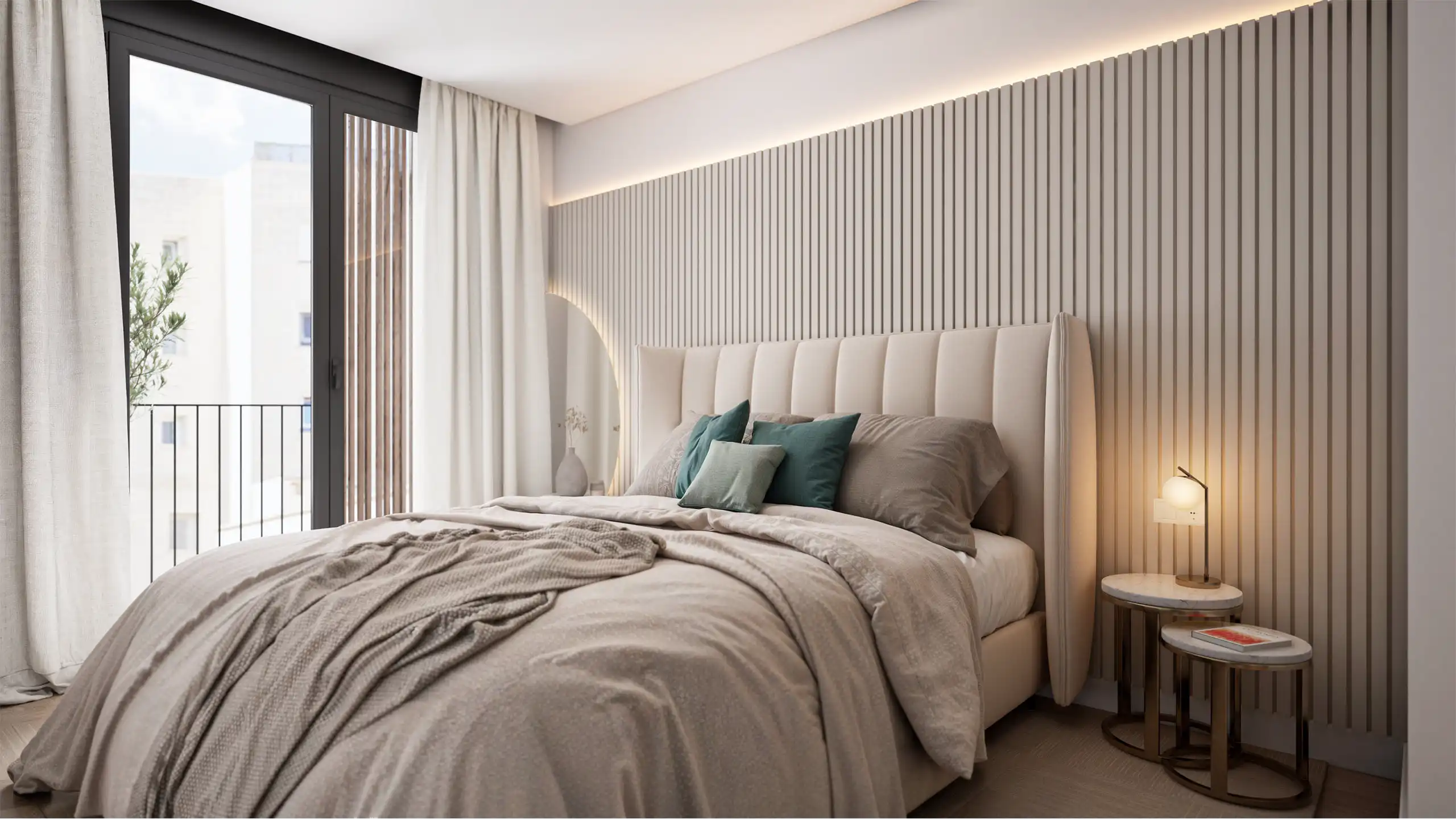 Bedroom with upholstered headboard, soft textiles and indirect lighting.