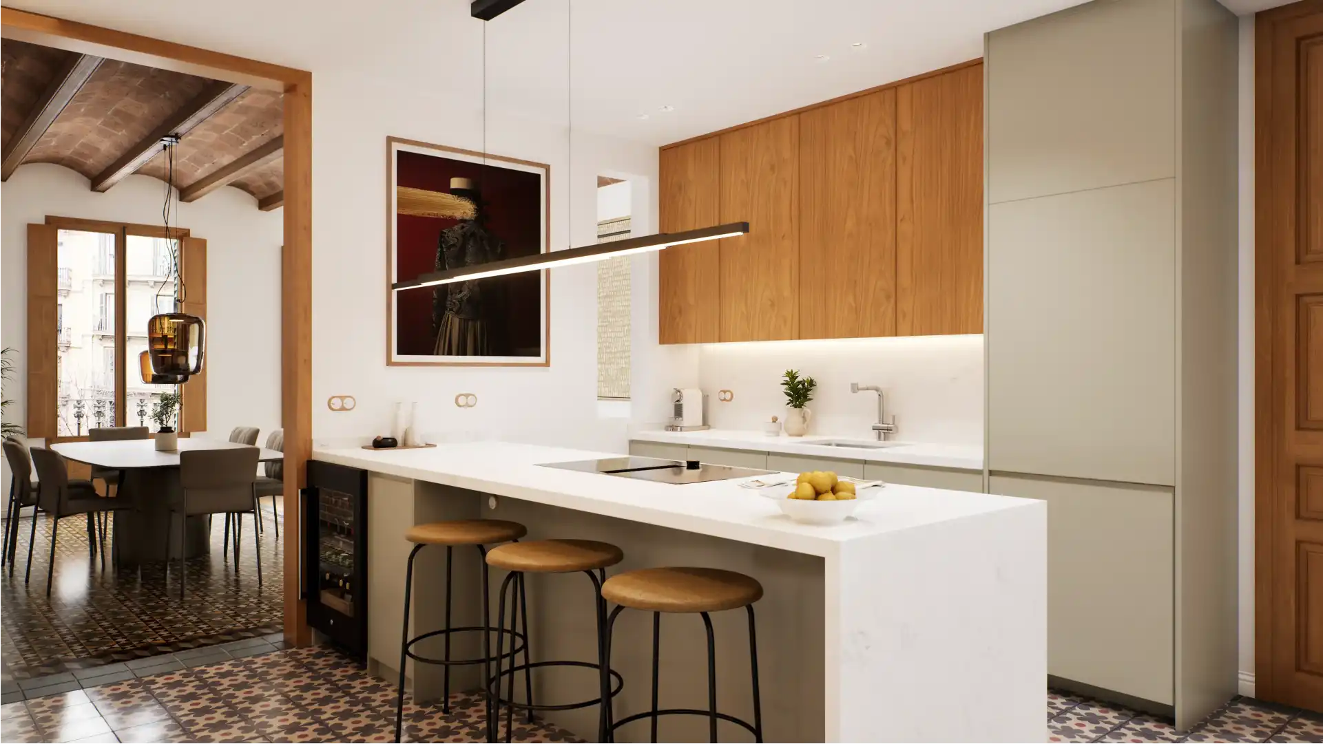 Open-plan kitchen with central island, wood cabinetry and minimalist design in a Barcelona residential apartment.