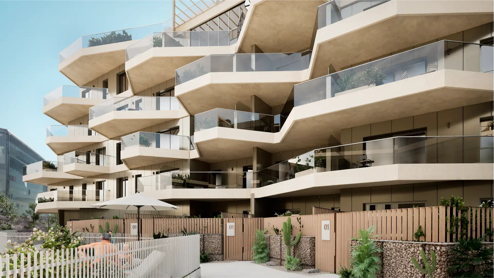 Modern residential complex facade with terraces and natural light in Malaga, Spain