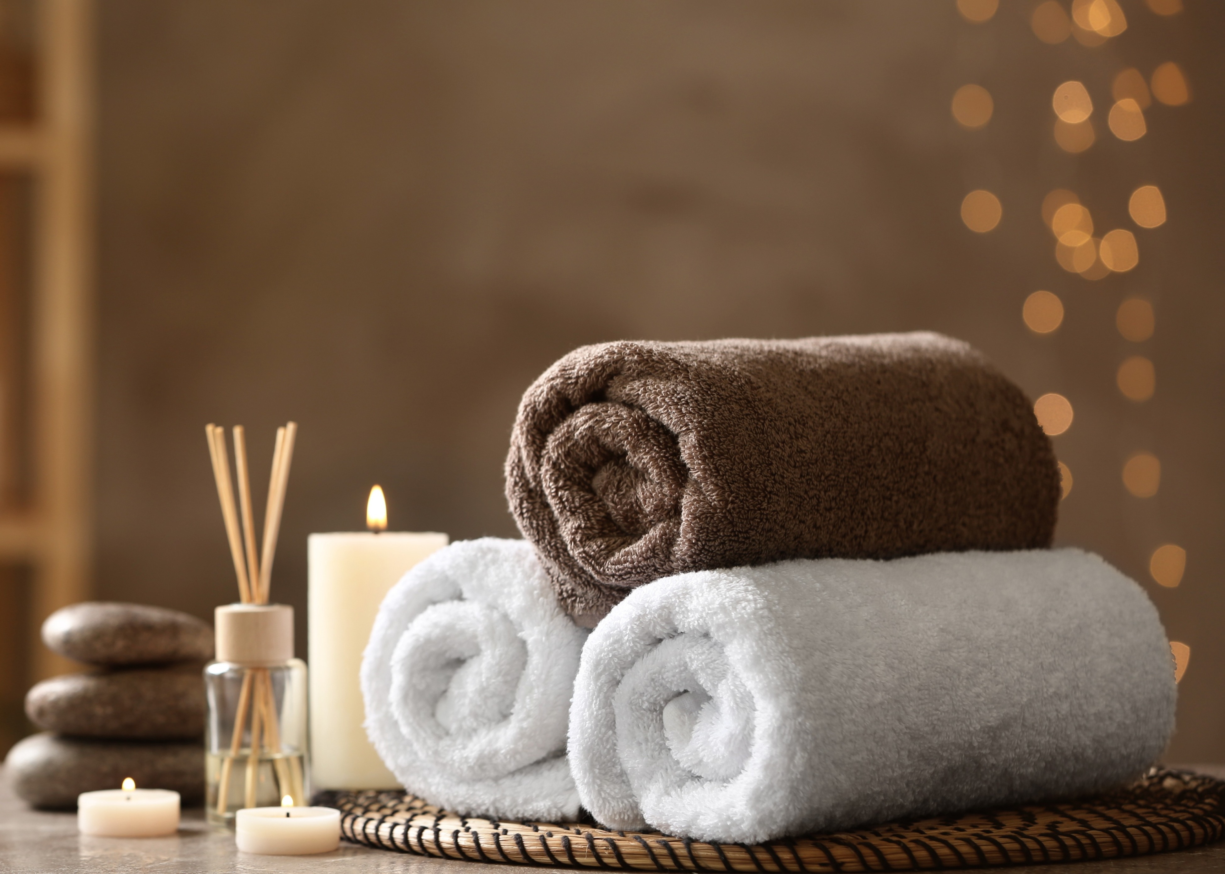 A couple of towels sitting on top of a table.