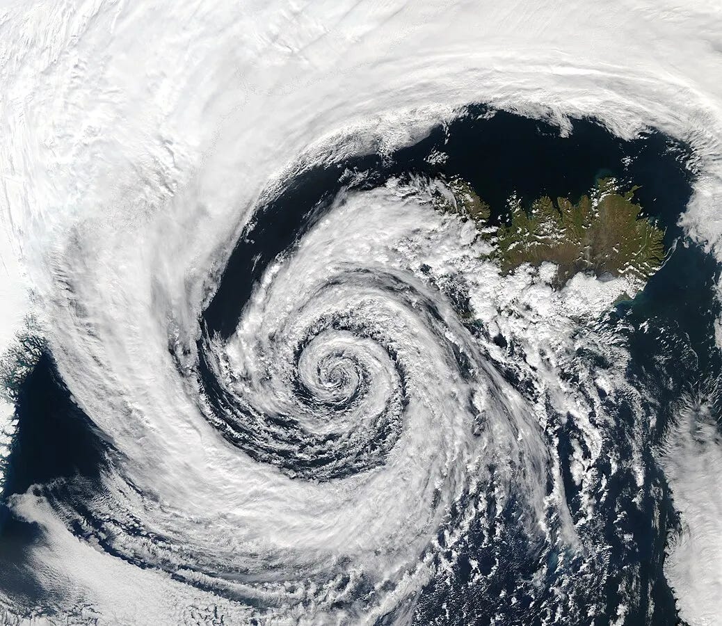 Beautiful satellite image of swirling clouds in a low pressure weather system.