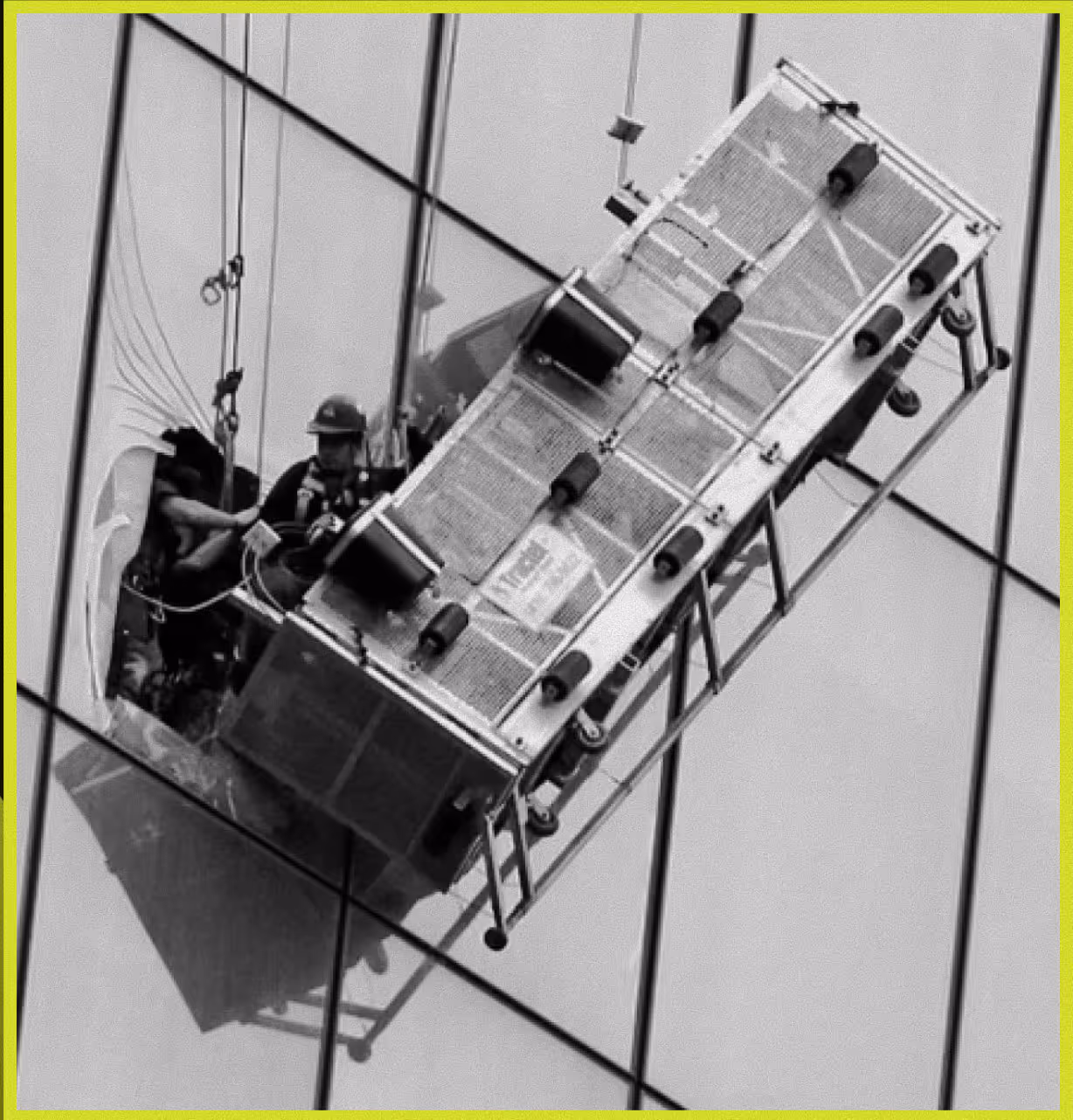 High-rise window cleaners using outdated manual methods