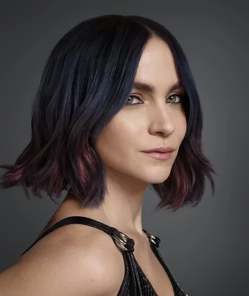 Redken glow blue reflect hair dye model.