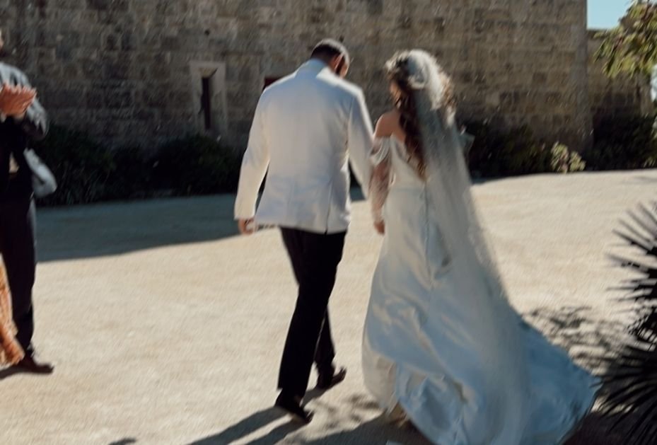 Bride and groom walking, from the Vogue Adria wedding skin preparation guide