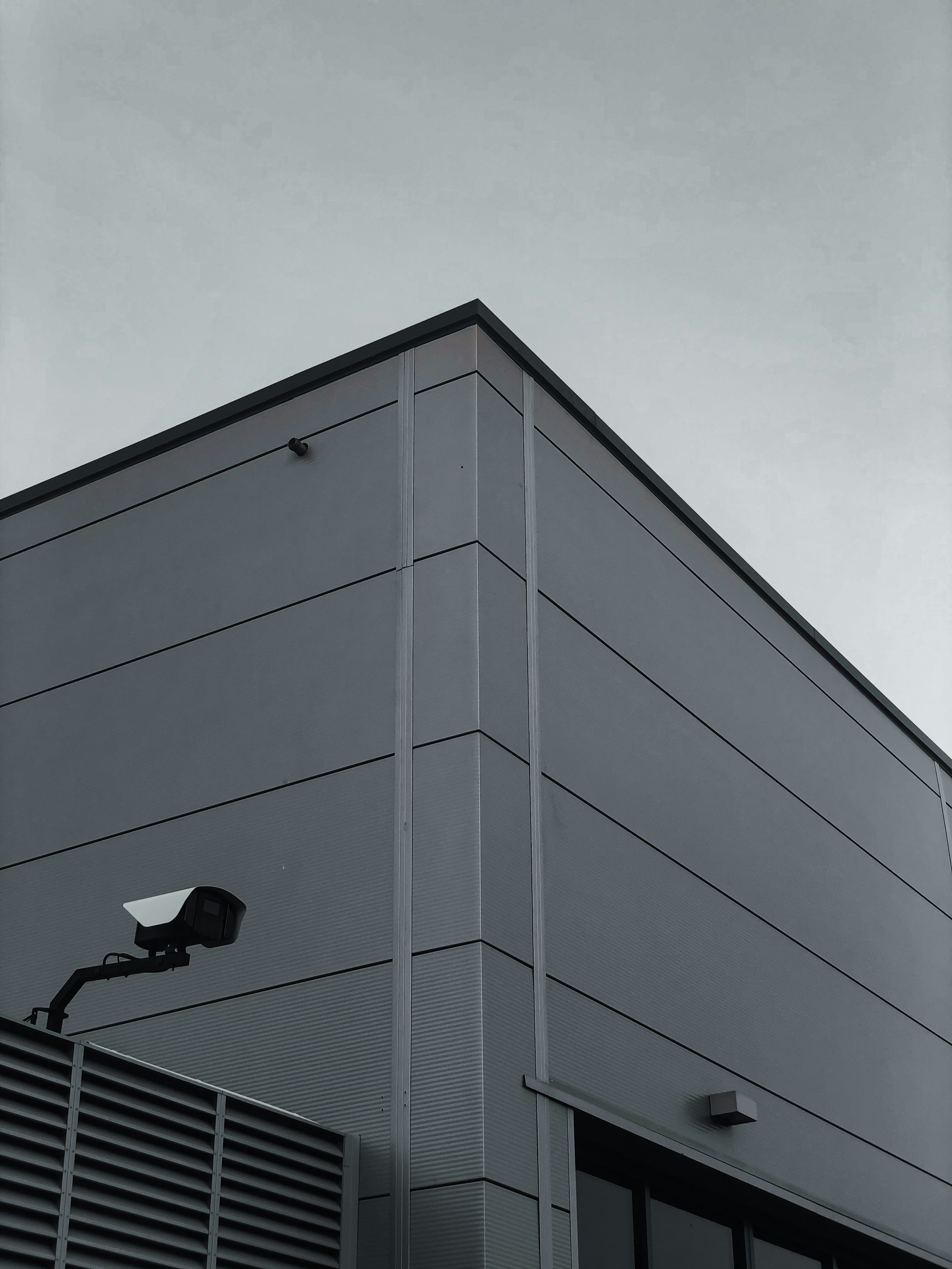 Sharp professional looking black tinted office building exterior.