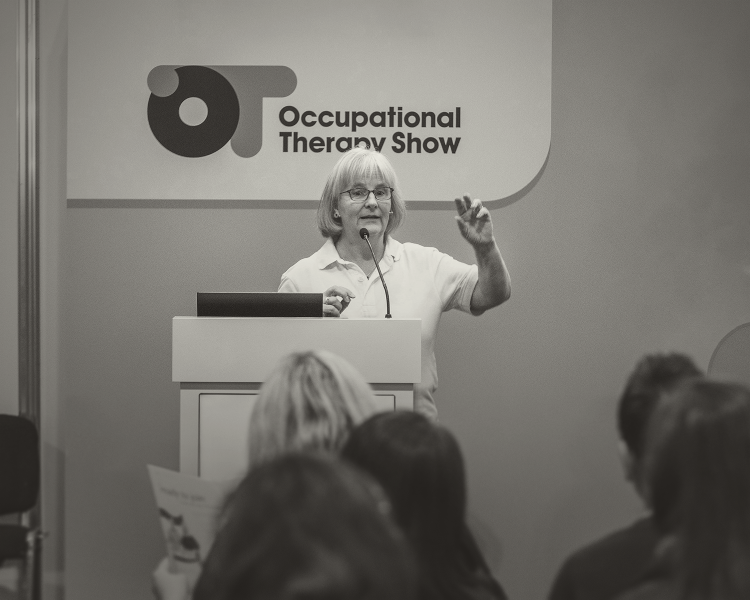 Kate presenting at a conference.