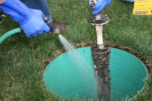 Spray filter with water to clean