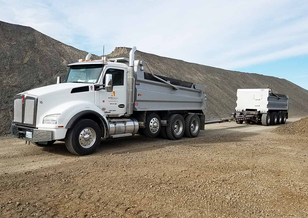 Anchor Hauling truck and pup for gravel delivery.