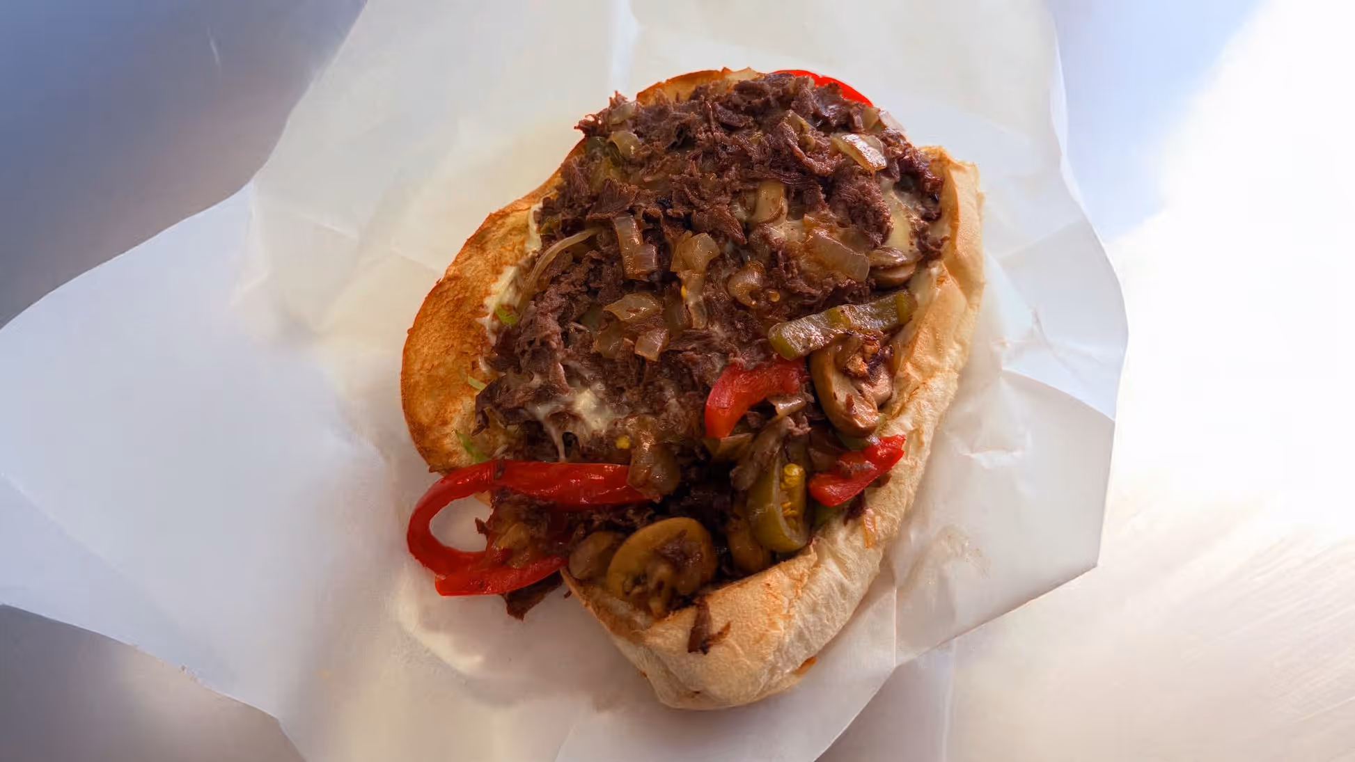 A loaded cheesesteak sub.