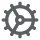 Gray mechanical cogwheel gear icon on white background.