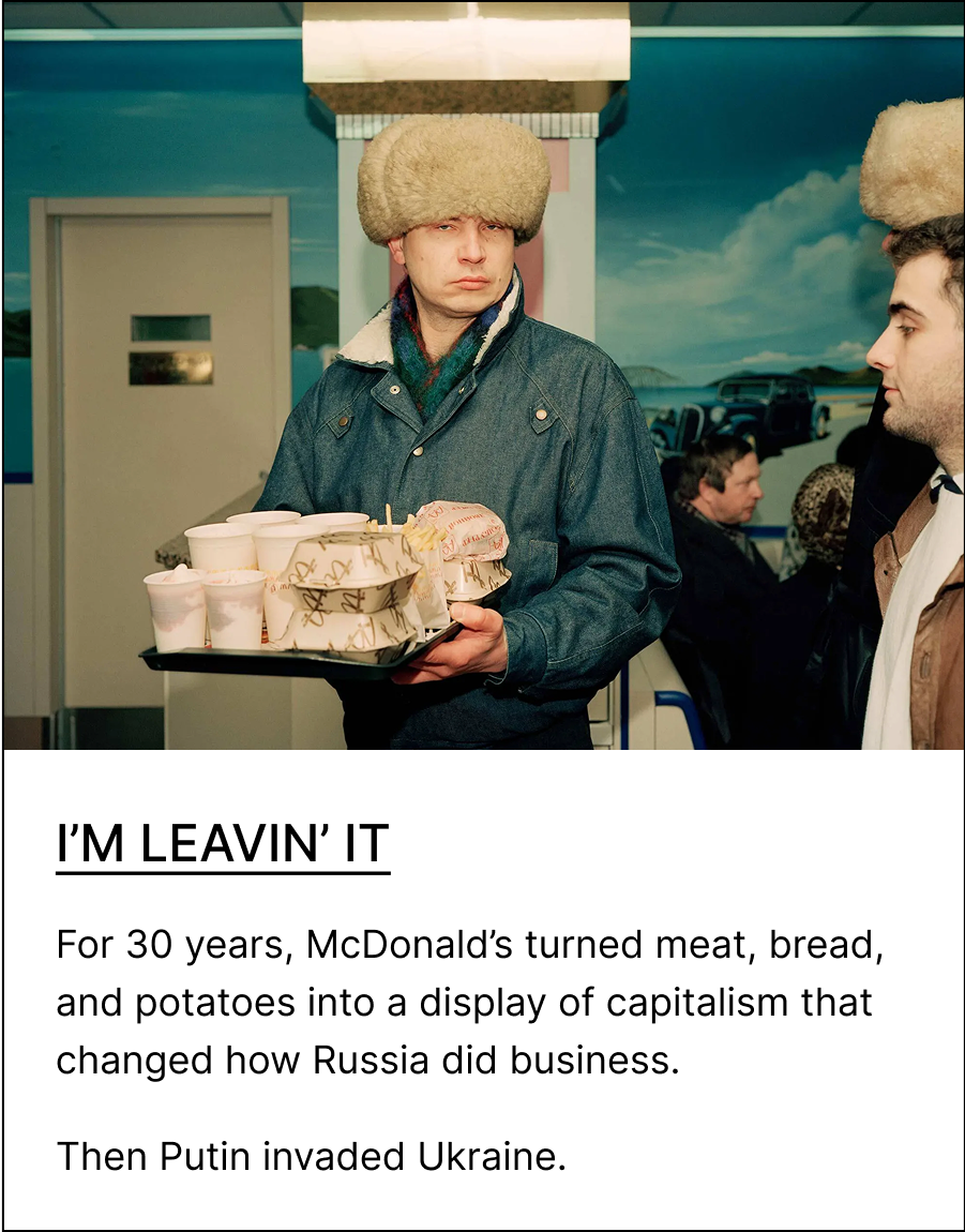 Soviet-era McDonald's customer carrying tray of Russian Big Maks