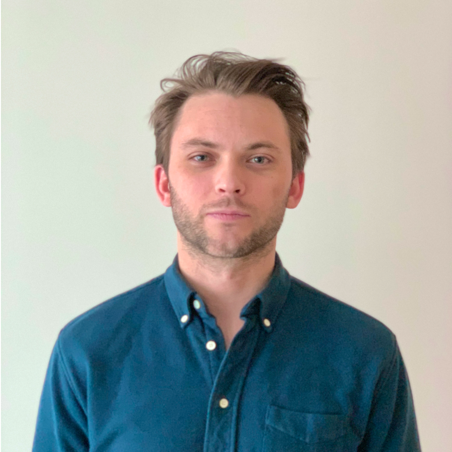 A bio photo of journalist Clint Rainey.