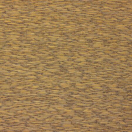Textured yellow-brown fabric.