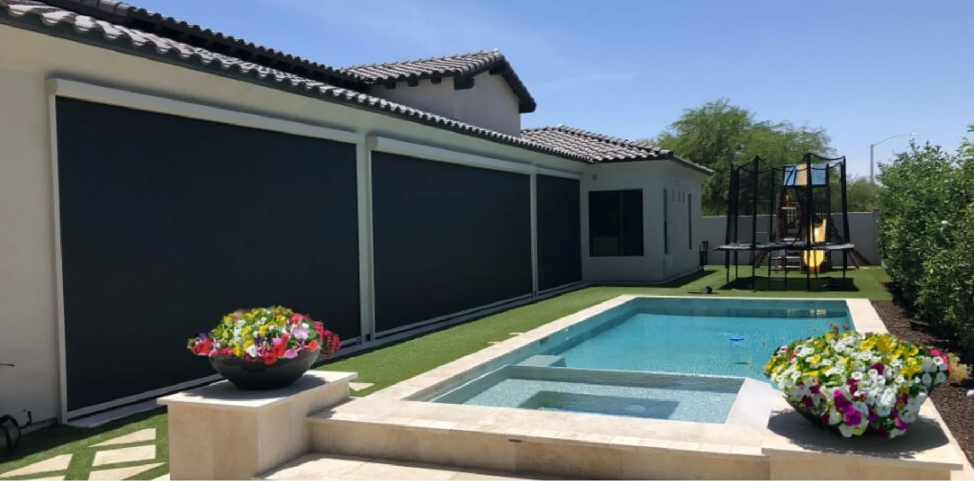 solar screen covering patio by pool