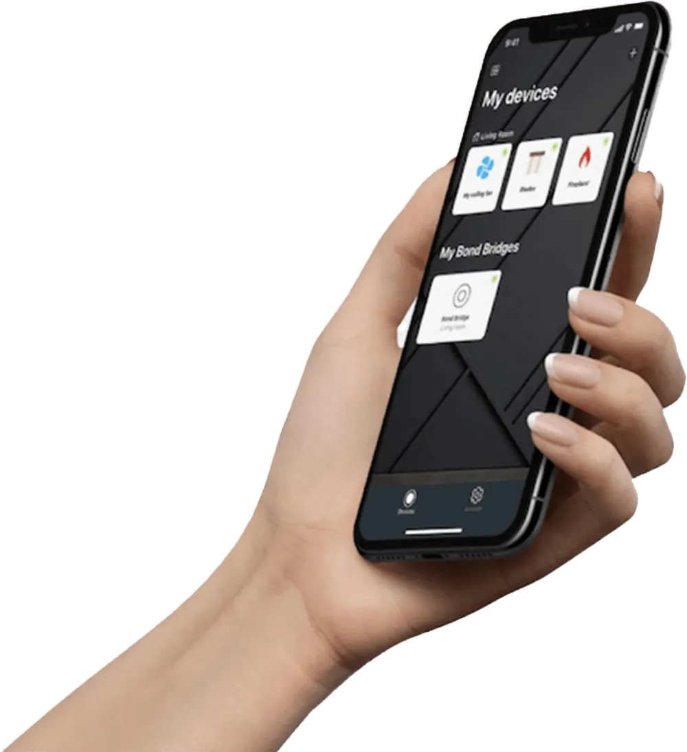 Hand holding smartphone with home automation app.