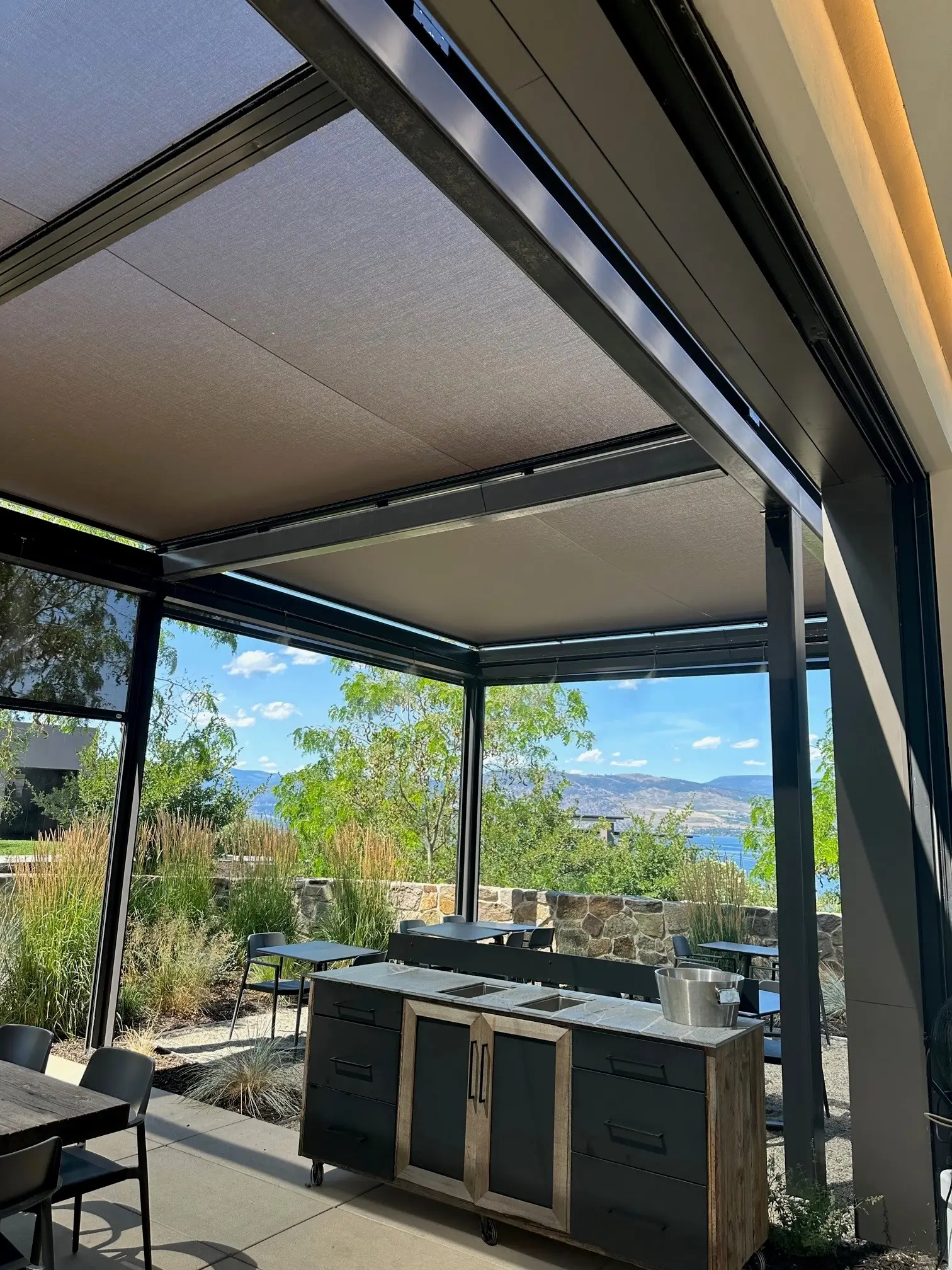 Outdoor patio with retractable shade screens in Phoenix