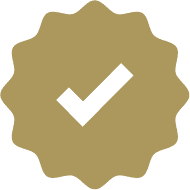Gold-colored icon of a shield with a checkmark in the center, symbolizing warranty or protection.