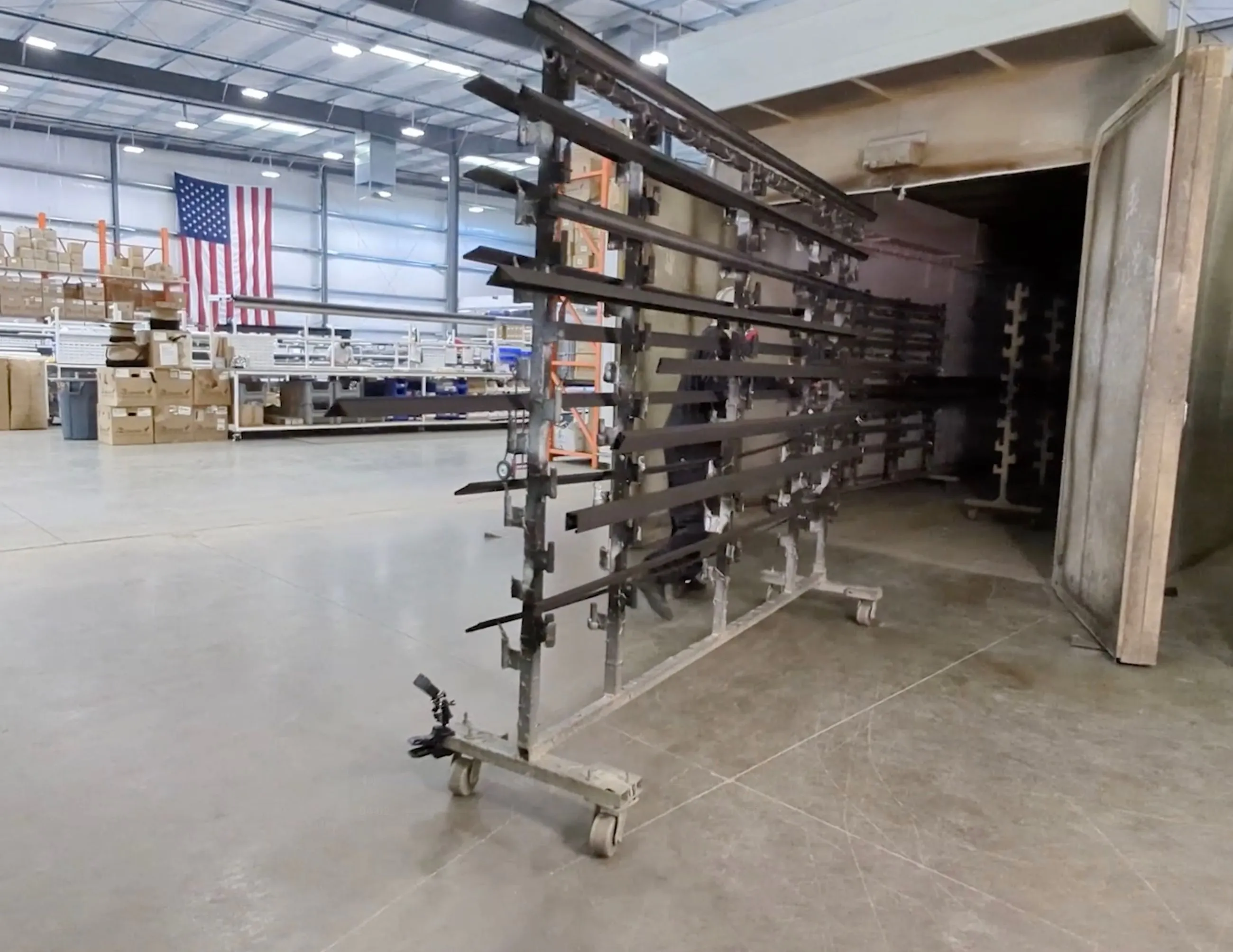 Automated powder coating line for metal parts