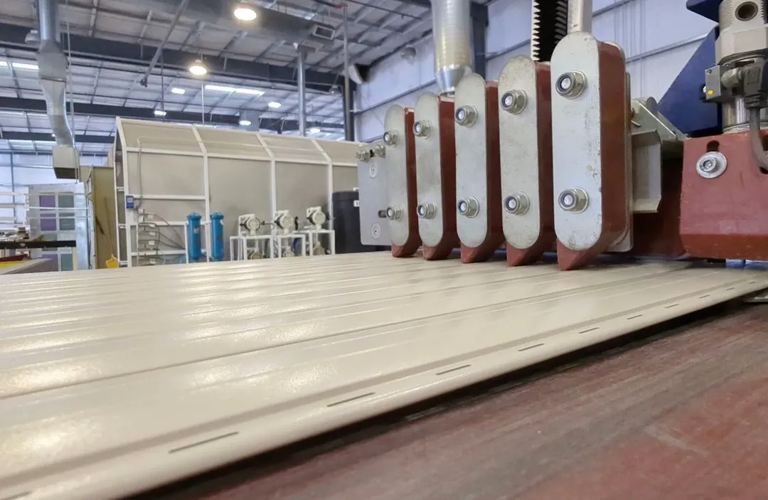 Shutter mat machine in industrial setting.