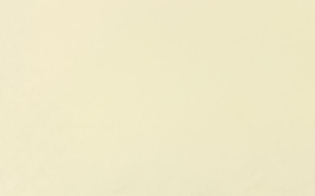 Plain light cream background.