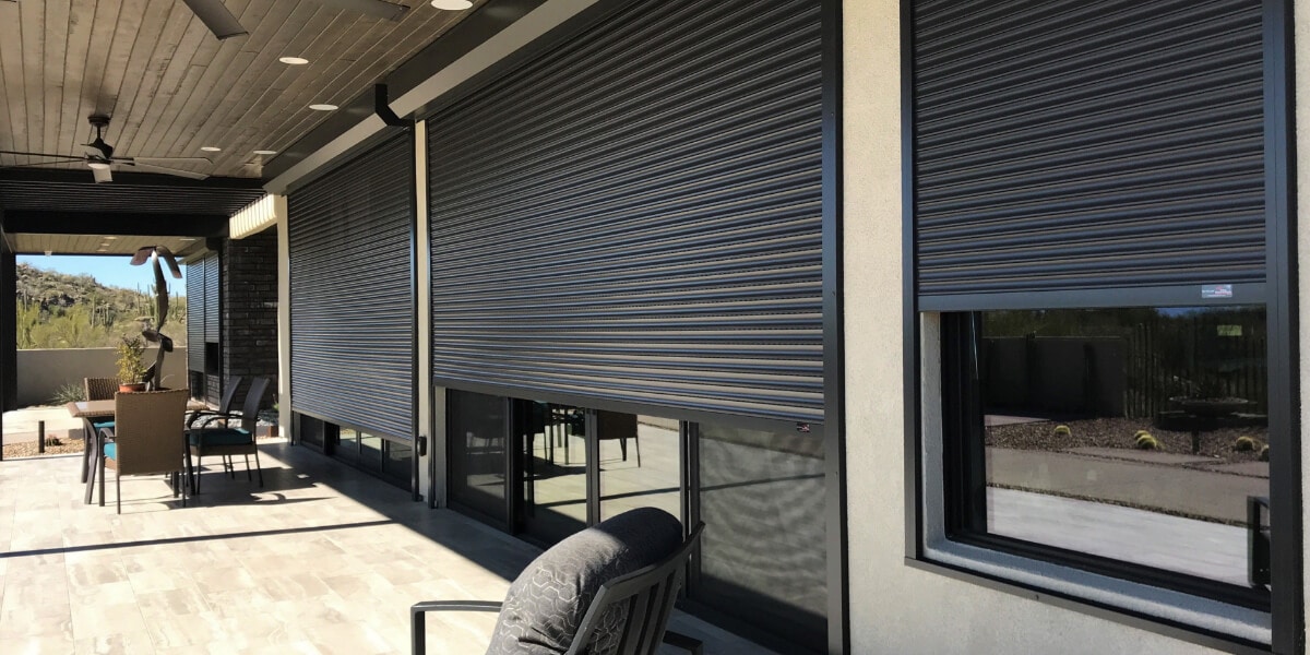 Patio with closed rolling shutters in Tucson, AZ.