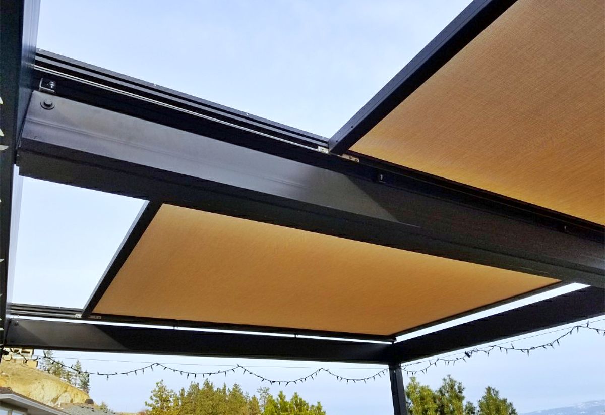 Retractable pergola canopy over outdoor area, Tucson.