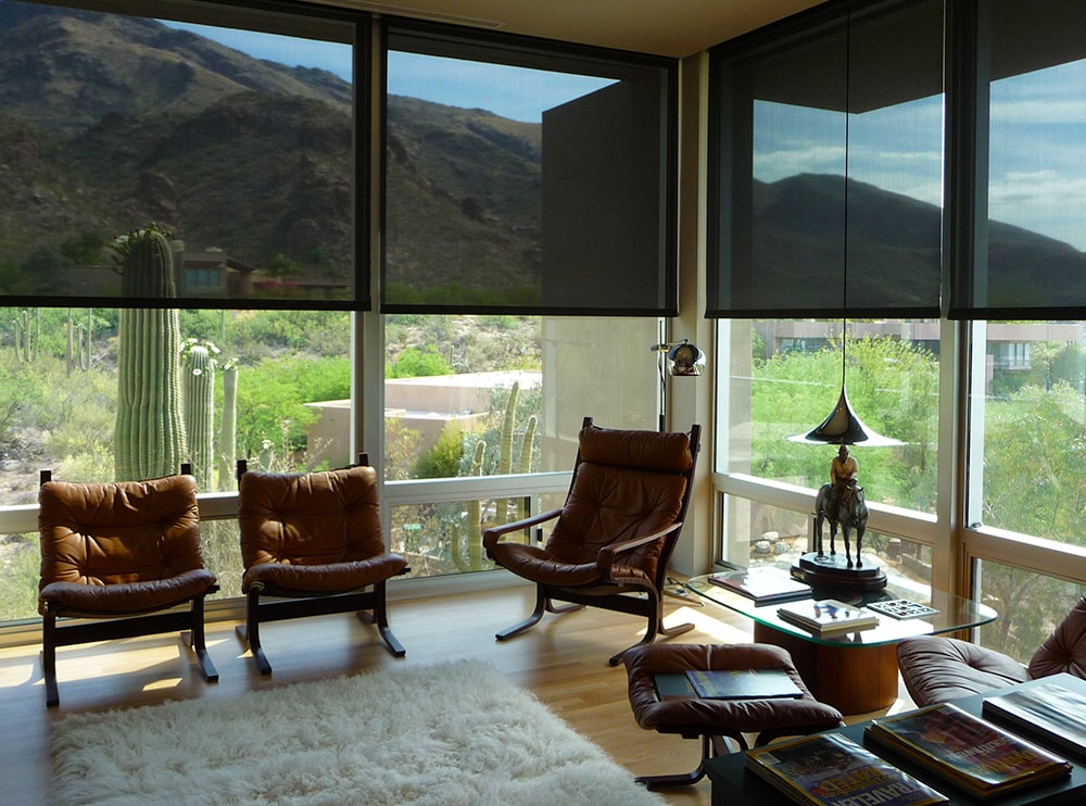 Living room with solar screens and desert view in Tucson, AZ.