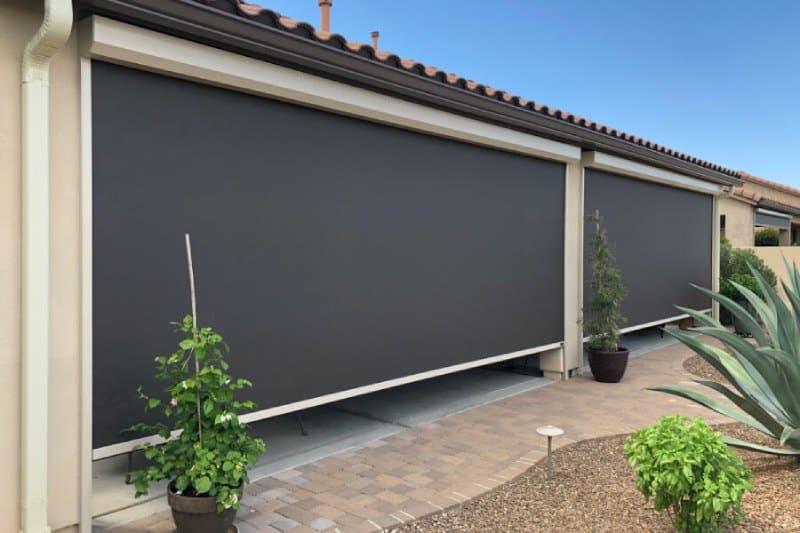 Outdoor solar screens on a Tucson house