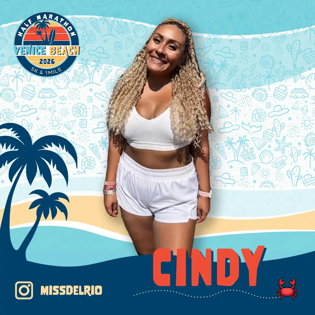 Smiling woman wearing black workout clothes standing in front of a colorful Venice Beach Half Marathon & 5K graphic with palm trees.