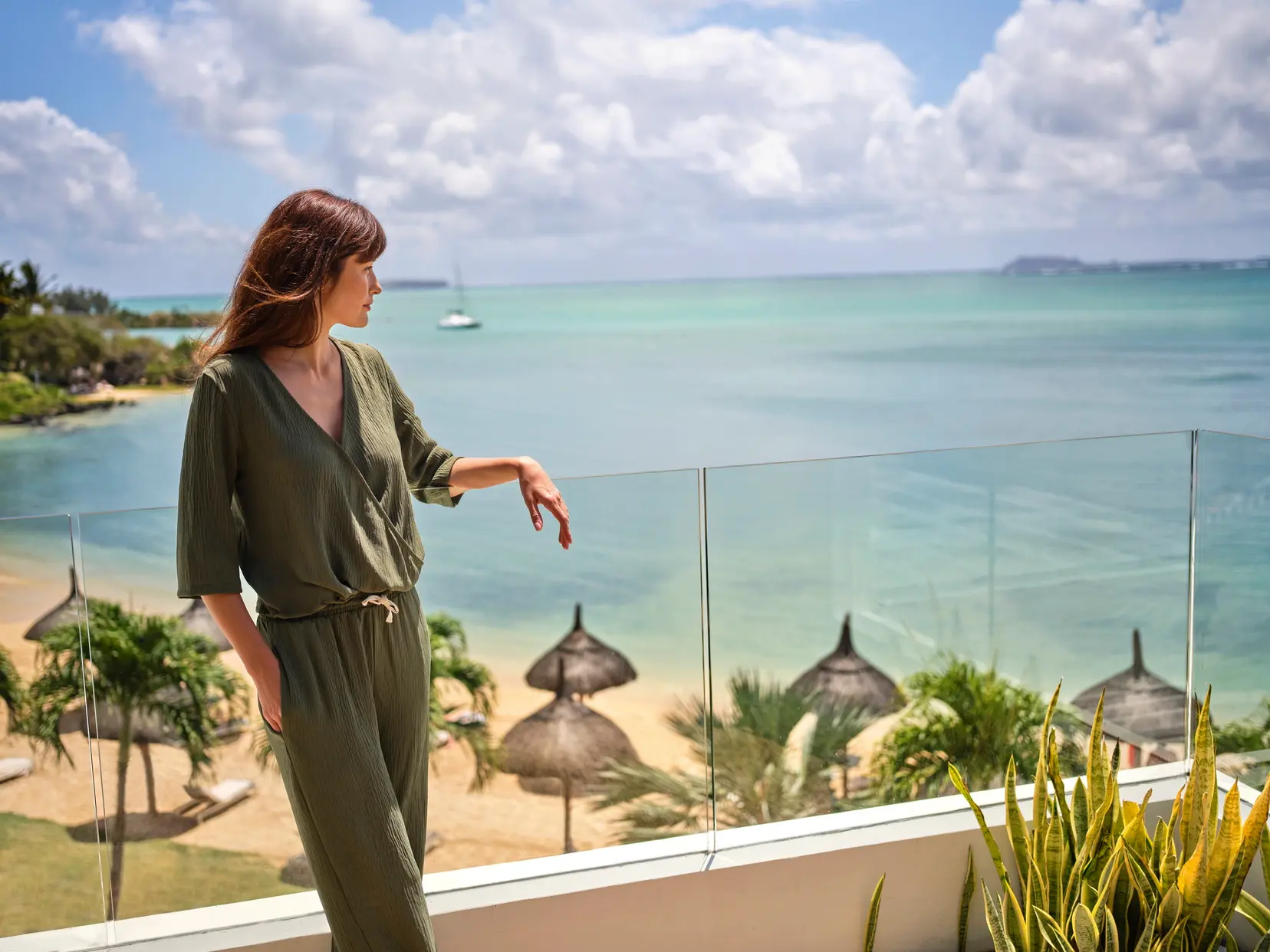 Verdant waterfall landscape in Mauritius with cascading cliffs and tropical foliage—Island Lilly’s immersive nature retreats rooted in serenity and renewal