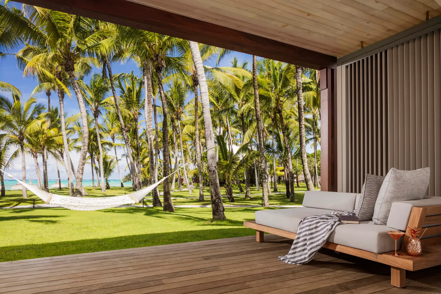 Sitting area of a garden view suite in a Mauritius hotel