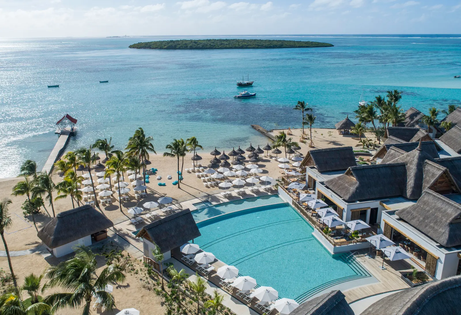 Waterside cabanas on a sand point overlooking the lagoon in Mauritius