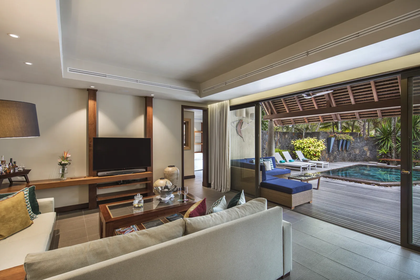 Sitting area of a garden view suite in a Mauritius hotel
