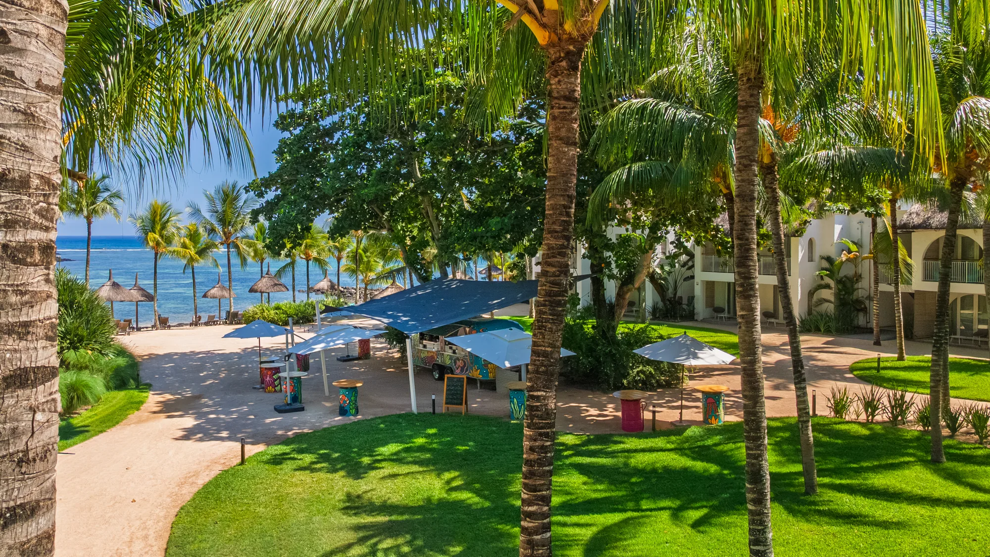 Resort restaurant sea facing at sunset mauritius