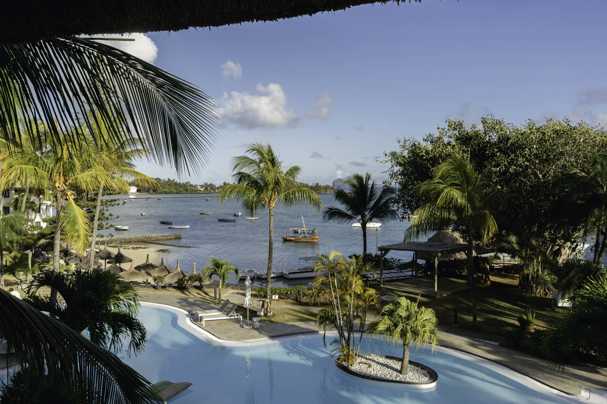 Sitting area of a garden view suite in a Mauritius hotel