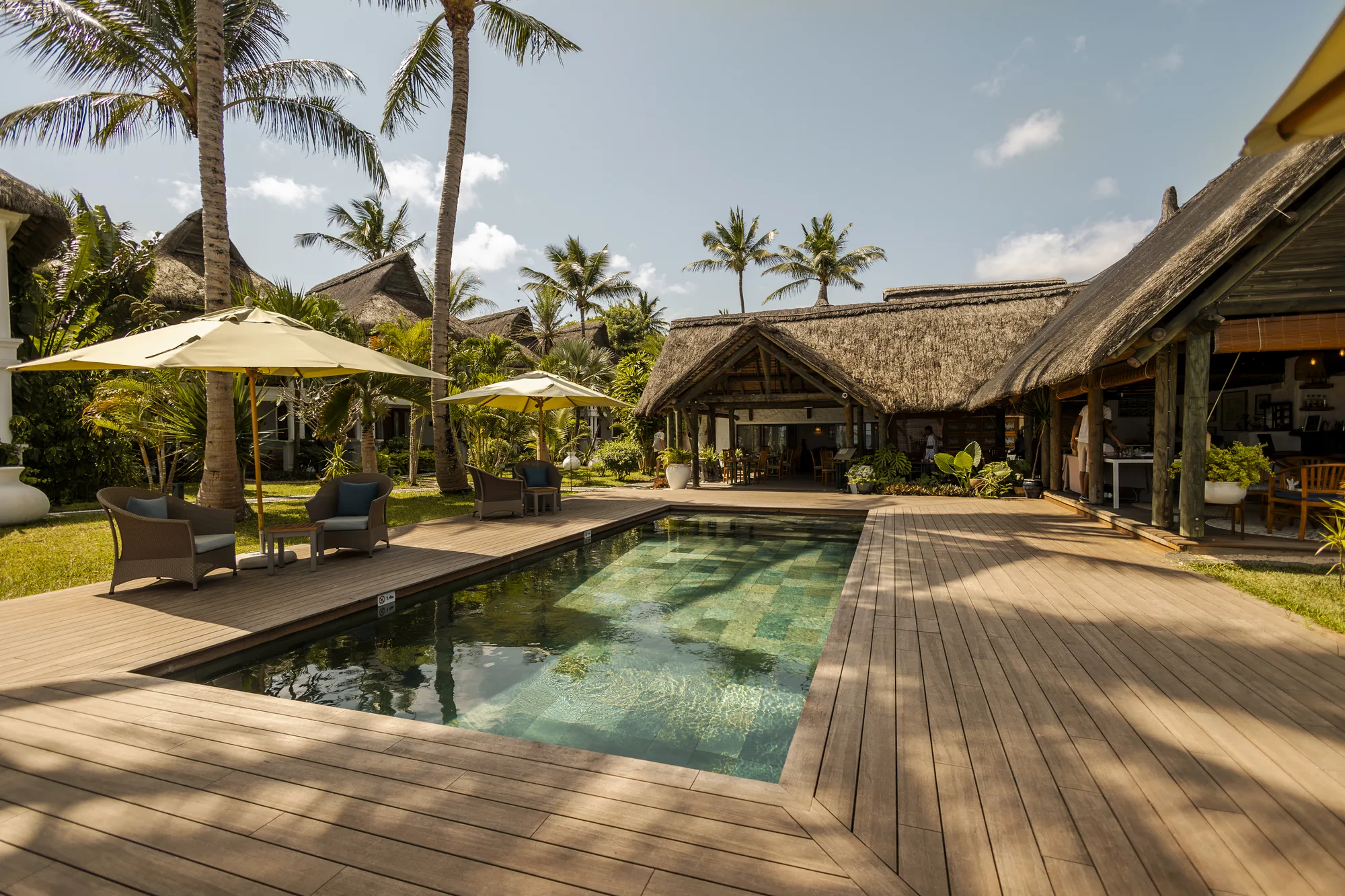 Sitting area of a garden view suite in a Mauritius hotel