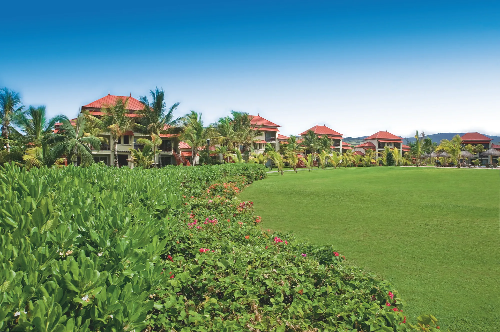 Sitting area of a garden view suite in a Mauritius hotel
