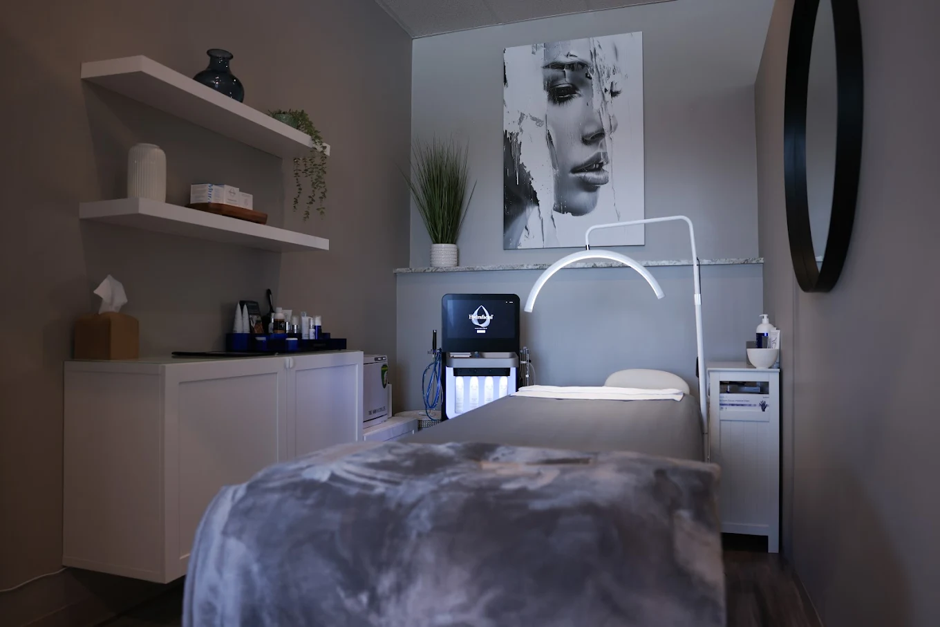 HydraFacial treatment room with calming decor and equipment
