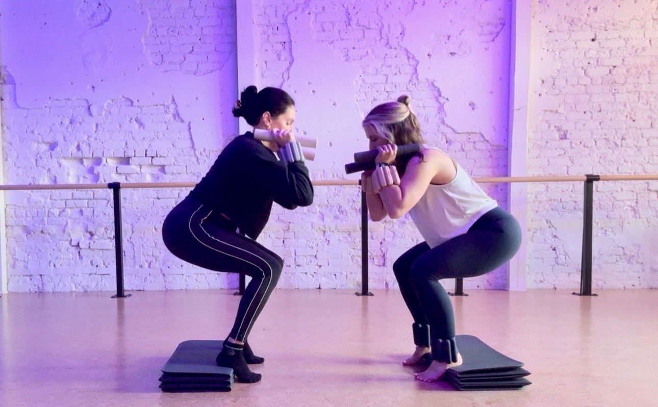 Two women doing a workout