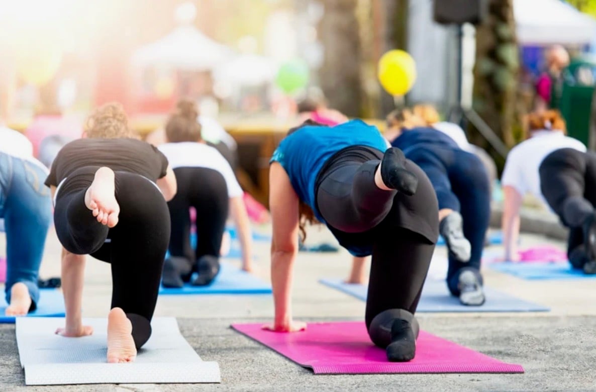 Women working out on mats