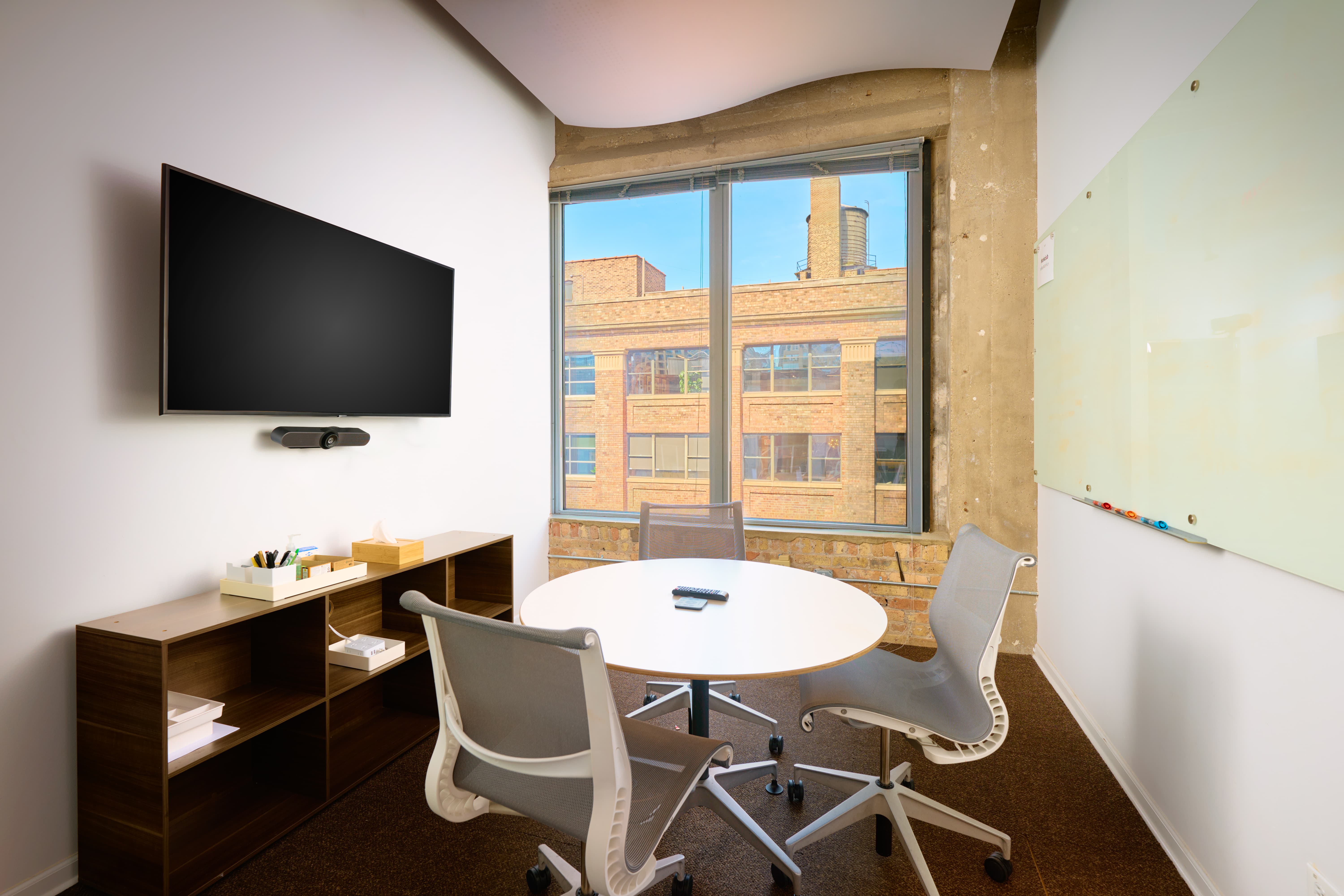 7:1 breakout room at Two Thirty, a private meeting space in the 7th-floor River North loft