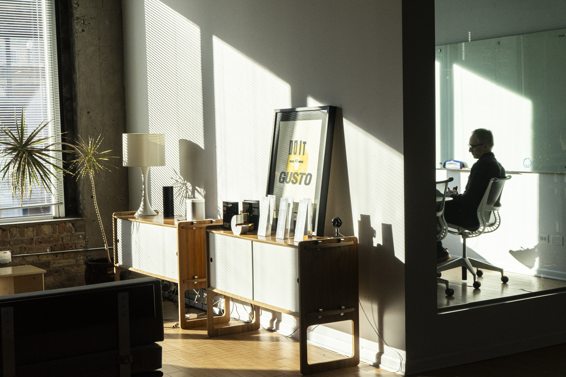 Two Thirty 7th-floor loft breakout room arranged for a small group meeting