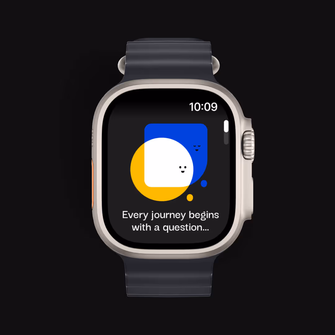Smartwatch with black band displaying time 10:09 and message 'Every journey begins with a question...' with colorful abstract shapes and smiley faces.