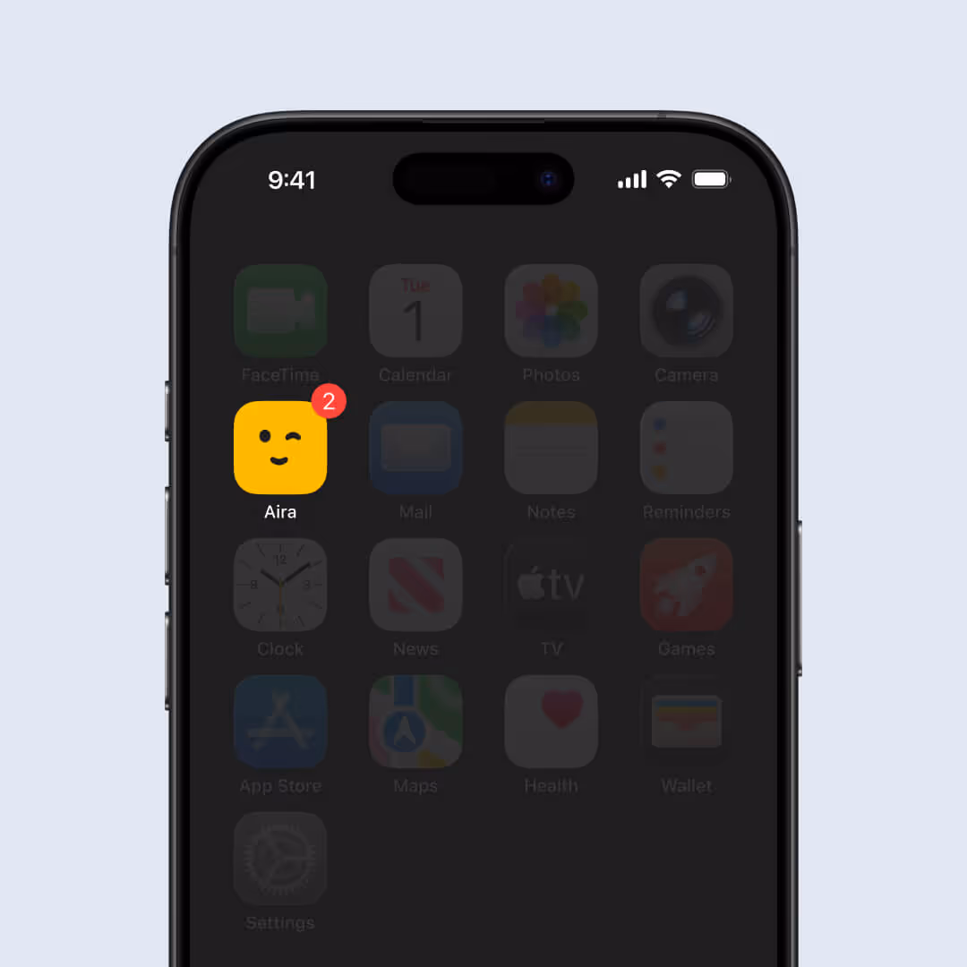 Smartphone screen showing the Aira app icon with a yellow smiling face and a red notification badge with the number 2.