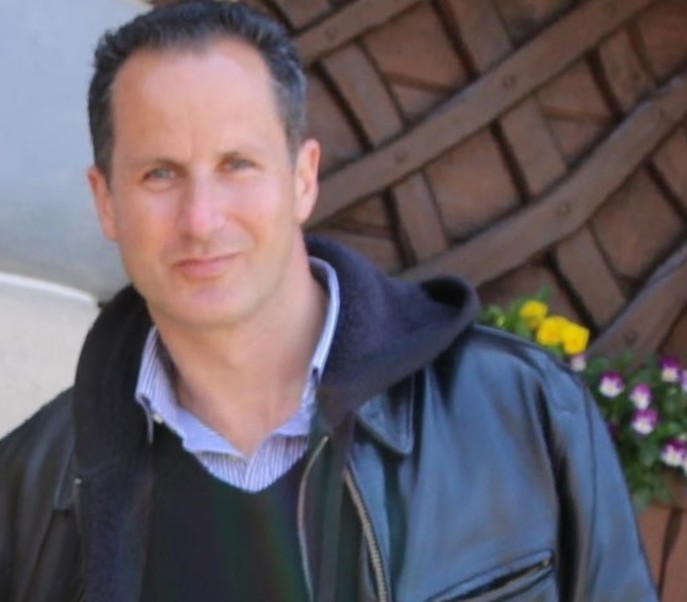 image of a traveler with a laptop