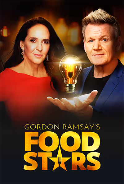 A man and a woman are holding a light bulb that says Food Stars.