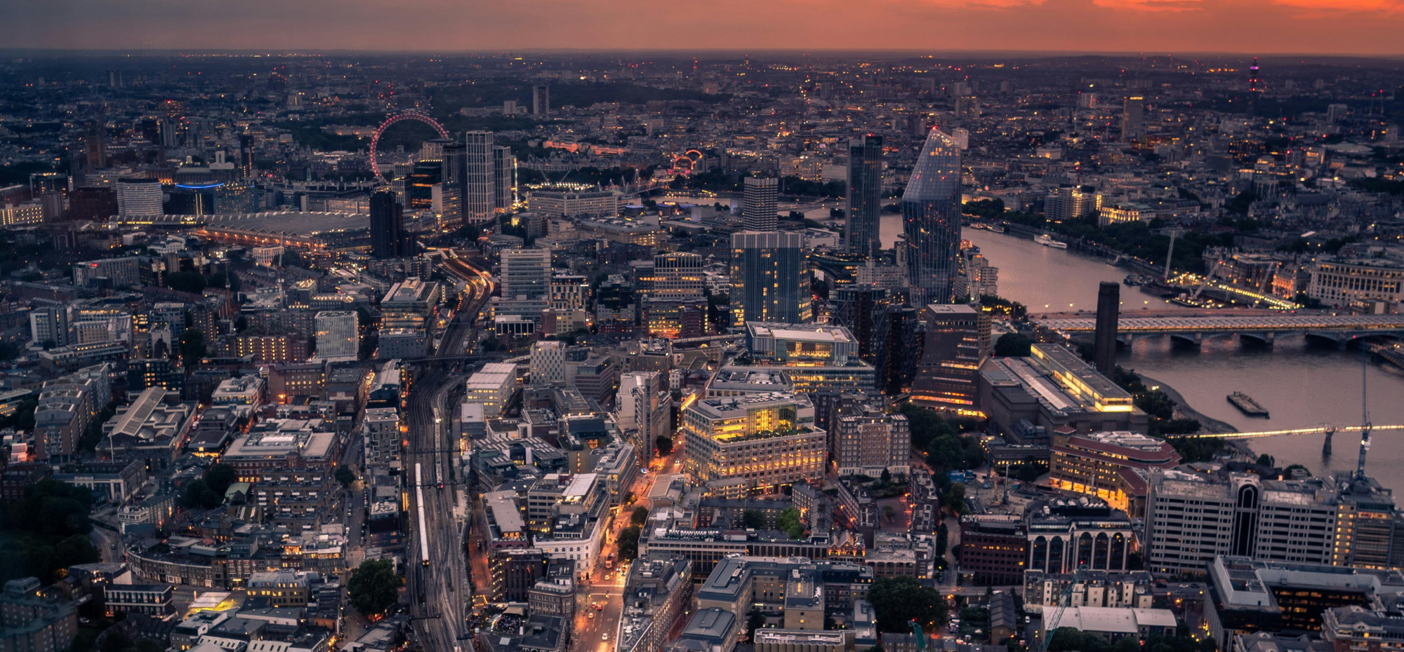 Aerial view of London city skyline at sunset for Applio Ventures investment page.