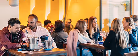 People enjoying dinner at TI restaurant