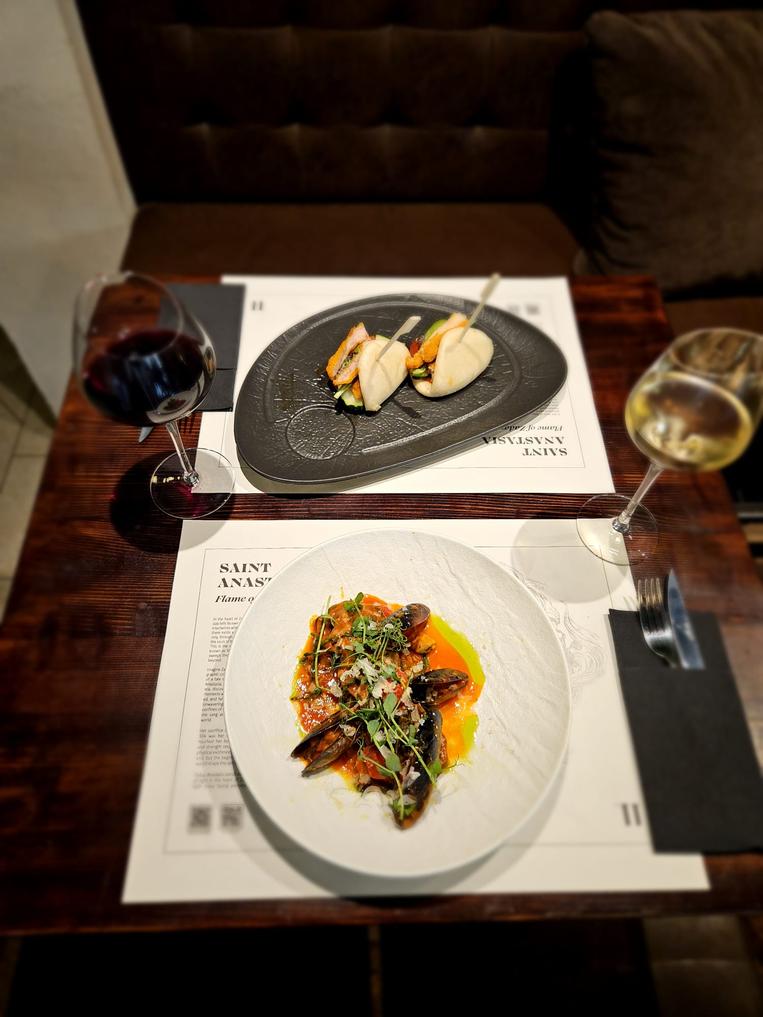 Two fine dining meals on table in TI Restaurant