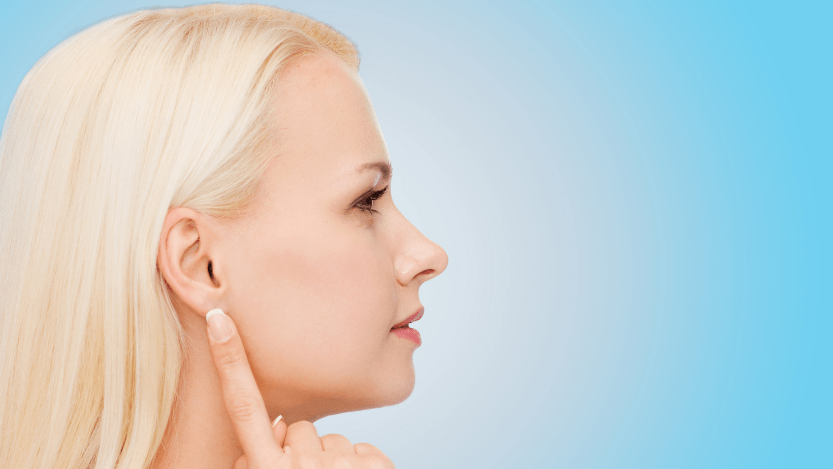 Woman touching her ear, indicating concern about HVAC noises, with a soft blue background, emphasizing the importance of addressing unusual sounds in heating and cooling systems.